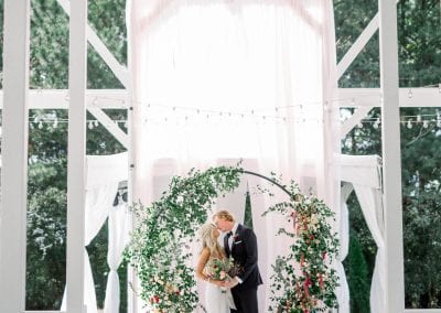 Covered arch & newlyweds