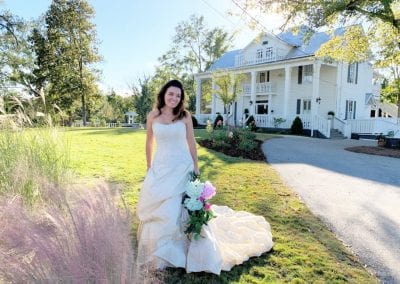 bride in front of manor